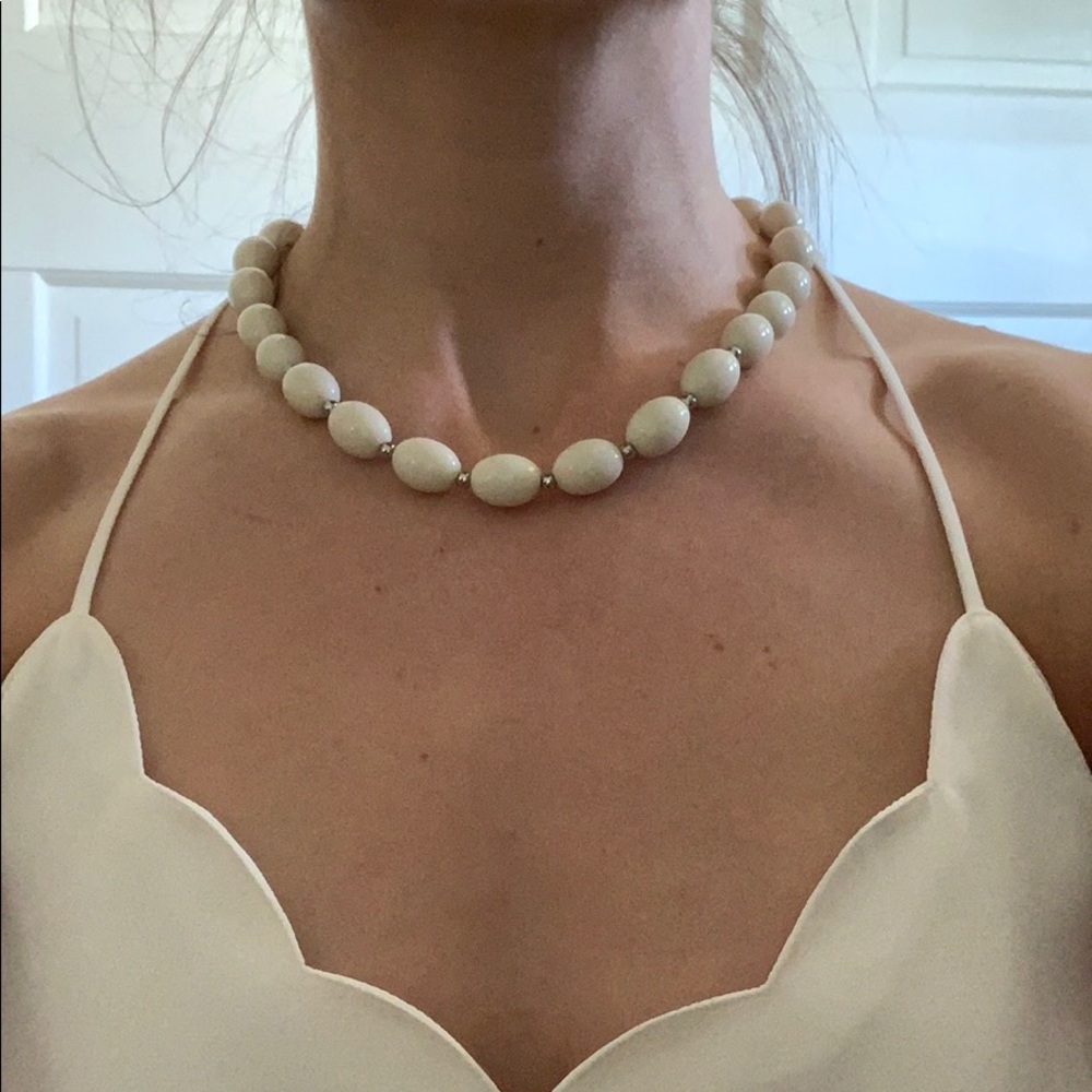Francesca’s white beaded short necklace